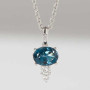 Deep blue topaz diamond pendant. Affordable proxy buying and secure combine delivery via Pinkbox